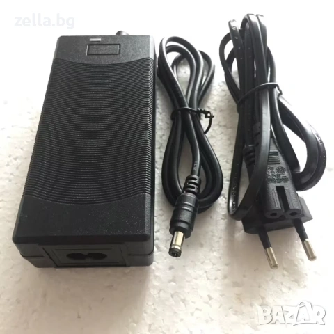 Зарядно устройство 24V Li-Ion 29.4V 2A 58W – за електрически тротинетки и велосипеди 10411, снимка 8 - Части за велосипеди - 54692874