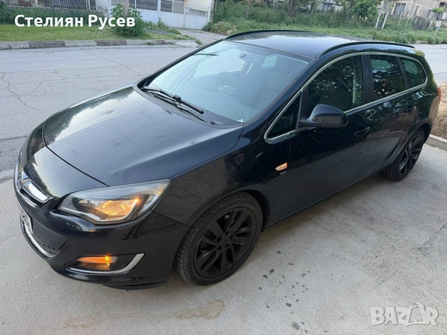 Opel Astra 1.7 CDTI 128кс климатик / дясна дирекция - цена 4693,99 лв или 2400 евро моля БЕЗ бартери, снимка 14 - Автомобили и джипове - 54597864