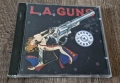 Компакт Дискове - Рок - Метъл: L.A. Guns – Cocked & Loaded, снимка 1