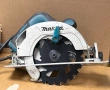 Makita HS6601 ръчен циркуляр комплект с нов диск 220V 1050W 165mm 5200 rpm, снимка 1