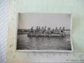 Снимка на мъже върху гумена лодка във водата стара, снимка 1
