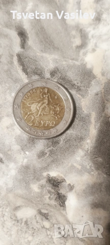 2 € 2002 г. Гърция със ( S ) в долната звезда 