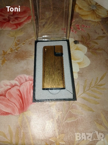 запалка Champ Tymo gold -чисто нова