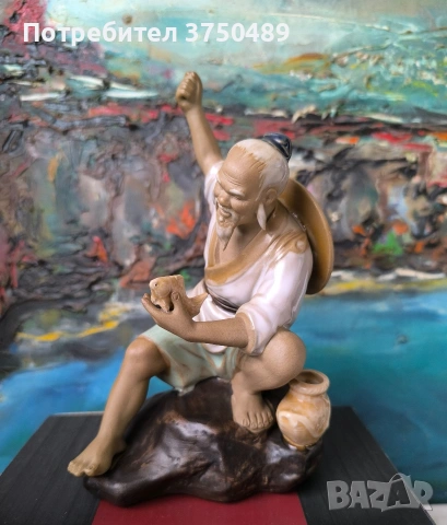 Фигурка на рибар