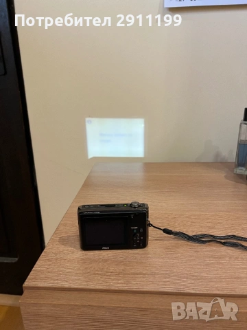 Фотоапарат Nikon 12.1Mp / Built-in Projector с подаръци, снимка 8 - Фотоапарати - 54625931