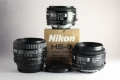 Nikon AF-Nikkor 50mm f/1,4 с HS-9 сенник и Nikkor 1,8/50 AF-Nikkor обективи, снимка 1