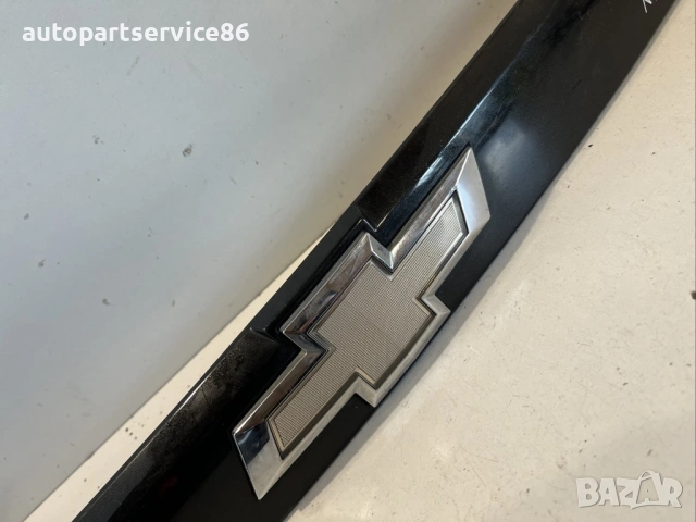 Задна лайсна на багажник за регистрационен номер черна за Chevrolet Trax 1.7 VCDI (2014) 95911413, снимка 3 - Части - 54644394