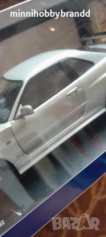 Nissan Skyline GtR R 34 1.18 Solido , снимка 9 - Колекции - 54484436