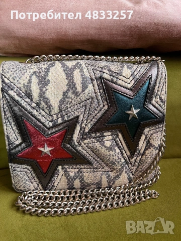 Оригинална чанта на Just Cavalli запазена,чантата върни заедно с торбичката .