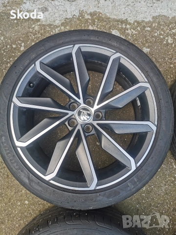 Skoda scala 5x100 18 , снимка 3 - Гуми и джанти - 54405448