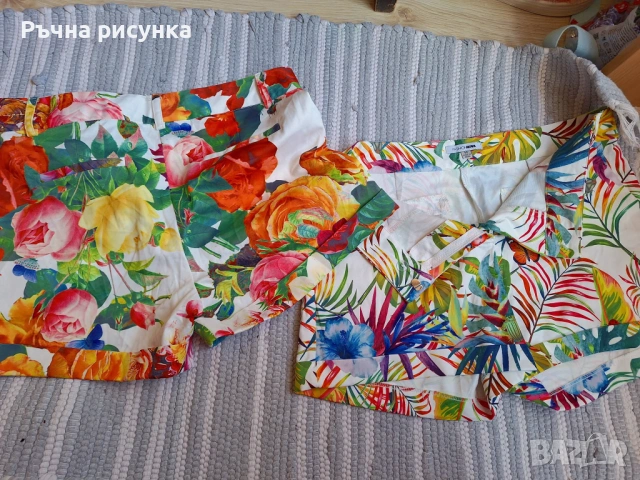 Два чифта прекрасни и цветни къси панталонки ,размер М ,без забележки !