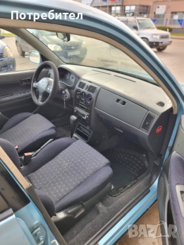 Daihatsu Sirion, снимка 14 - Автомобили и джипове - 54244160