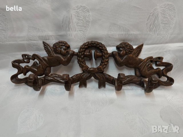 Ретро закачалка от масивен чугун – Бароков стил с ангели .