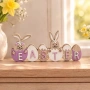 Великденска дървена декоративна табелка „Easter" с зайчета и яйца, лилаво-бяла – 24×2×9.3см_1233659, снимка 1