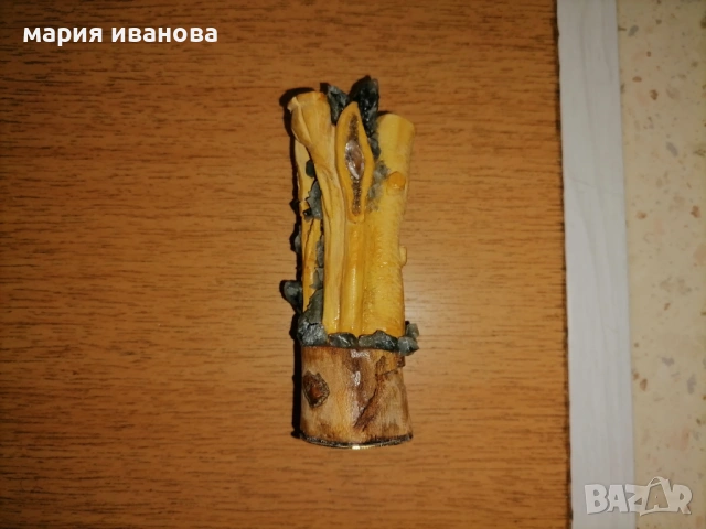 Фигура от чемшир и камъни