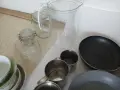 Лот от различни домакински посуди: тигани, прибори, купички, преси, буркани, канчета, белачка за кар, снимка 4