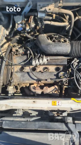 Mazda Tribute  2.0, снимка 9 - Автомобили и джипове - 55571611