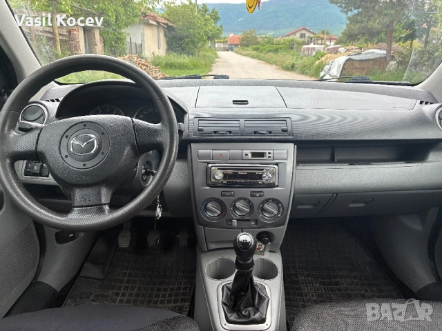 Mazda 2, снимка 9 - Автомобили и джипове - 54601471