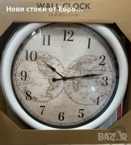 Стенен Часовник 38,5 см.   Работи с 1 батерия АА .  Диаметър:38,5 см.  Налични цветове: бяло и черно