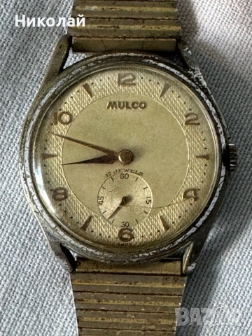 MULCO -SWISS МЕХАН.ЧАСОВНИК