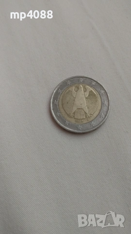 евро монета 