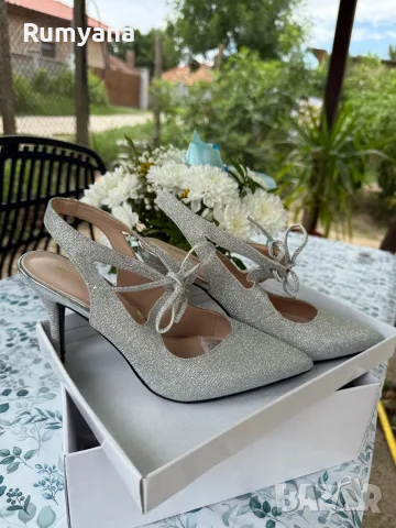 сребристи дамски обувки на тънък висок ток с отворена пета (тип slingback), снимка 3 - Дамски обувки на ток - 55432374