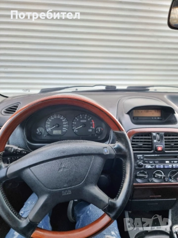 Mitsibishi Carisma, снимка 15 - Автомобили и джипове - 54252303