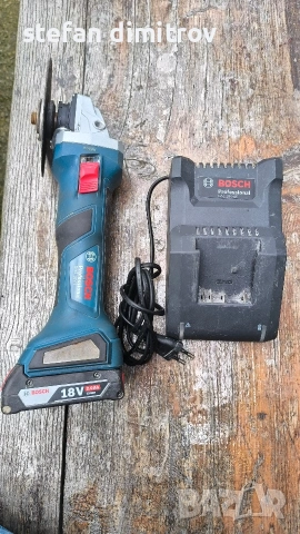 Bosch GWS 18V-7, 12.5 cm, 11000 RPM, 18 V батерия, 1.6 kg, черен/син плуз зарядно и 2 Ah батерия 
