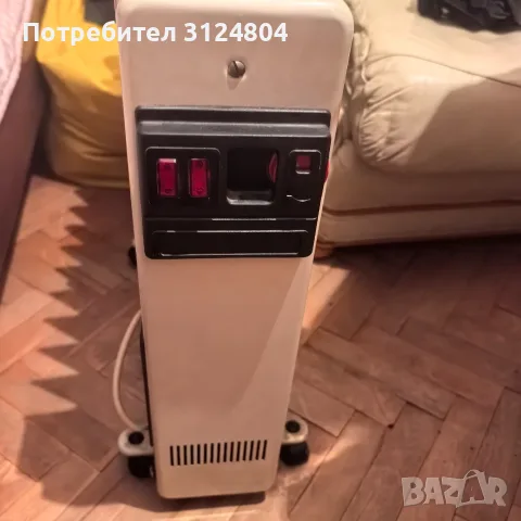Маслен радиатор на ток