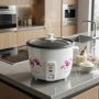 Компактен електрически оризовар 0.6 л с функция готвене и поддържане на топло, снимка 3