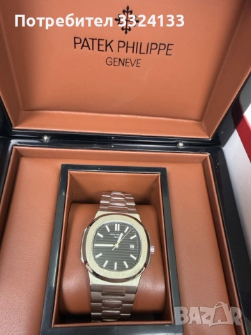 Patek Philippe Nautilus 40mm
Black Dial