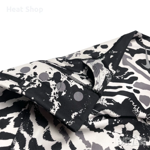 Дамски клин Nike Fast 7/8 Animal Print Performance Running Tights, снимка 3 - Клинове - 54689263