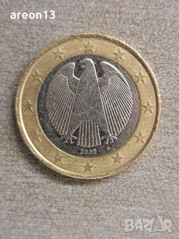 1 евро 2002 G изместен център 