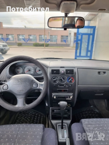 Daihatsu Sirion Автоматик, снимка 12 - Автомобили и джипове - 54252284
