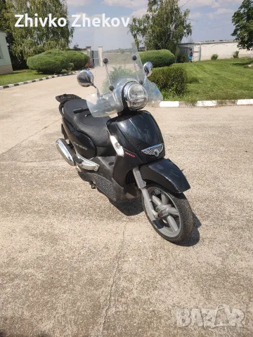 Асприля скарабео 300s