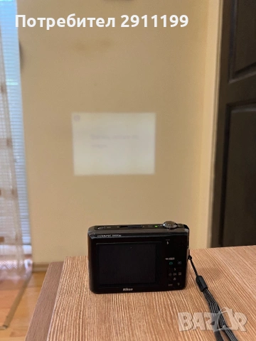 Фотоапарат Nikon 12.1Mp / Built-in Projector с подаръци, снимка 9 - Фотоапарати - 54625931