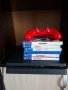 Sony PlayStation 4 с червен контролер DualShock 4 и набор от игри FIFA, снимка 1