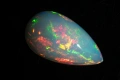 Естествен етиопски опал 3.74ct капка кабошон, снимка 3
