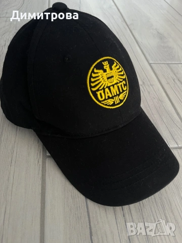 Шапка с козирка OAMTC