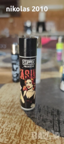 Колекция от 37 оригинални запалки Clipper + подарък дисплей (поставка), снимка 7 - Колекции - 54563525