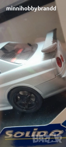 Nissan Skyline GtR R 34 1.18 Solido , снимка 13 - Колекции - 54484436