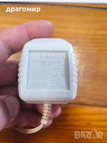 PHILIPS SBC CS0920/00W 230v-50Hz 6,6w 9v -200mA, снимка 2 - Батерии, зарядни - 54629365