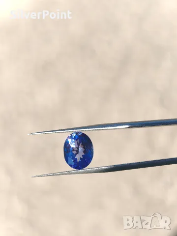Танзанит чист на лупа 3.12ct с швейцарски сертификат , снимка 2 - Други - 55620792