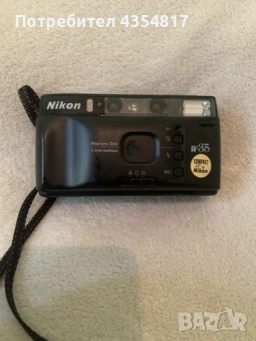Фотоапарат Nikon W35 с 35-милиметров 
