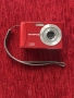червен цифров фотоапарат Olympus T-100, снимка 1