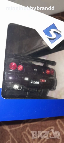 Nissan Skyline GtR R 34 1.18 Solido , снимка 16 - Колекции - 54484436