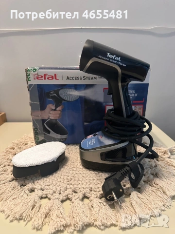 Уред за гладене с пара Tefal.