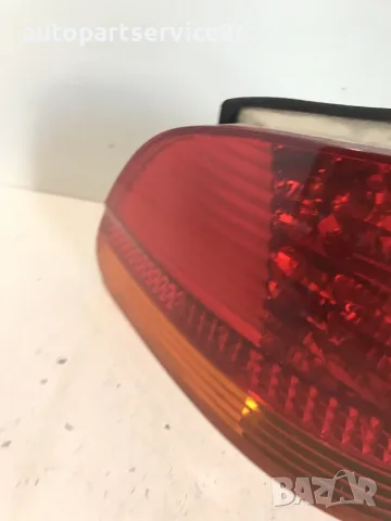 Заден ляв стоп Hella за BMW E65 740D (2004), снимка 2 - Части - 55359868