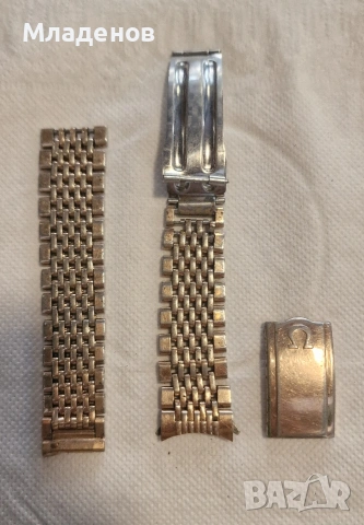 Позлатена верижка от Omega .