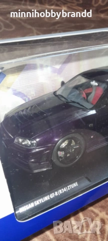Nissan Skyline GtR R 34 1.18 Solido , снимка 8 - Колекции - 54484436